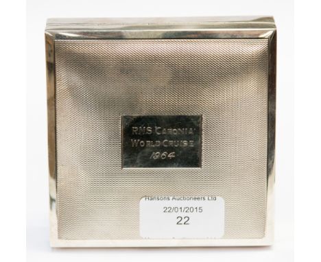 An Elizabeth II silver cigarette box, inscribed 'RMS Caronia World Cruise 1964', square form with engine turned decoration, 1