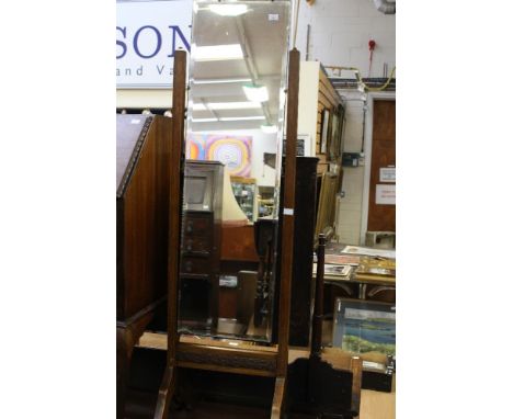An early 20th century folding card table, a cheval mirror and a pair of beech deck chairs, (4)