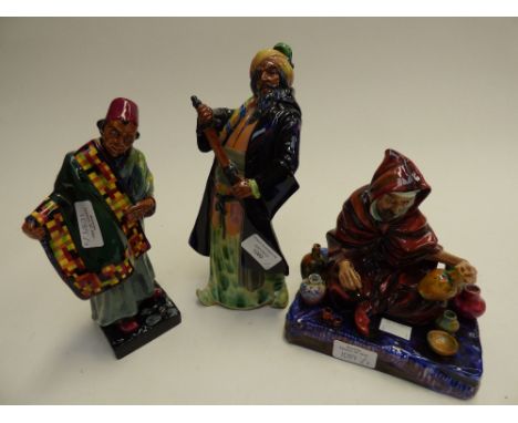 Royal Doulton figures - The Potter HN1493; Blue Beard HN2105; Carpet Seller HN1464 (3)