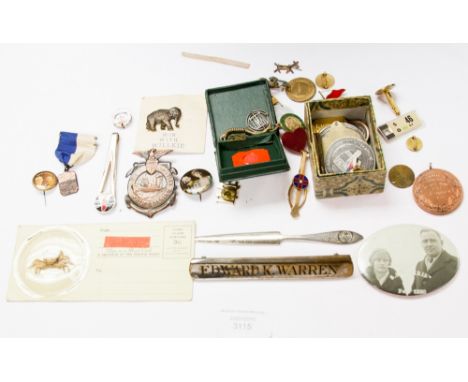 A collection of medallions and badges, including first class fencing medallion, won in 1914, etc
