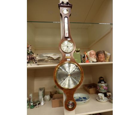 Barometer by Comitti of London with inlay and ivory detailing