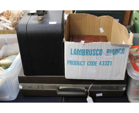 A briefcase, a vanity case, a boxed set of playing cards, etc (6) 