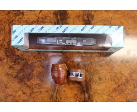 HMS Cornwall (1815 launch) a napkin ring made from the timber of the ship and a match stick barrel made form the timbers from