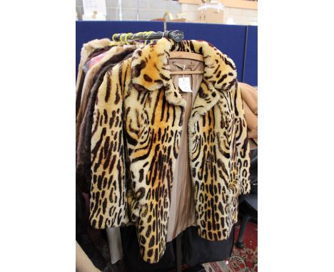 A 1950s leopard print beaver lamb by Walker Kerner, patch pockets with overlay flaps and inner swing ties 