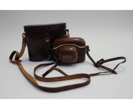 A pair of Binoculars, complete with case, together with a 1960s camera with case, (2)