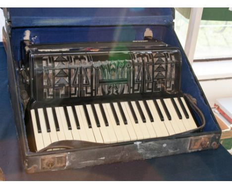 A piano accordion circa 1930s in original case 