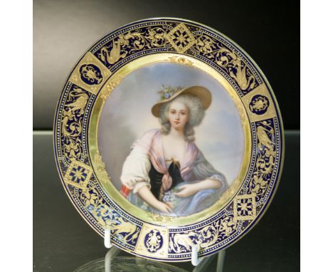 A good Austrian Vienna porcelain cabinet plate, enamelled with titled portrait of a half length lady, titled 'Elizabeth a Sch