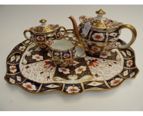 A Royal Crown Derby Imari 2451 four piece tea service including tray, teapot, sucrier, and jug (4)