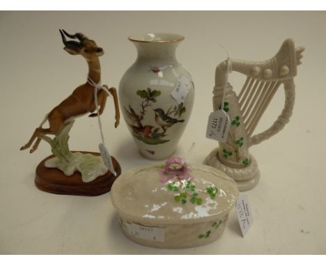 A Belleek harp ornament with shamrock detail, together with a Belleek oval box and cover, a Hungary vase with ornithological 