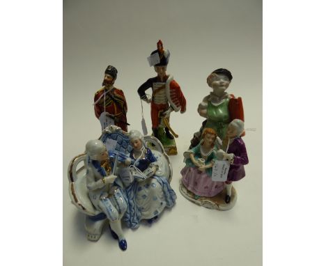 A collection of Continental ceramic figures including Capo di Monte style, Herend etc. (5)