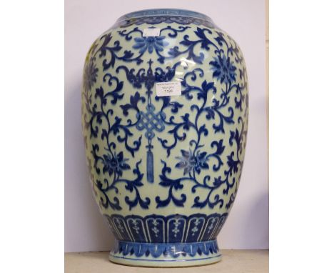 A Chinese blue and white large vase, 19th century, possibly reduced in size, the ovoid body painted with Buddhist objects sus