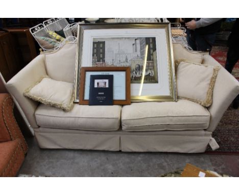 A modern Knowle drop side sofa, upholstered in cream