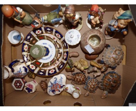 A box of small ornaments including Wade Whimsies, Hummel figures, etc 