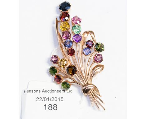 A rose gold gem-set spray brooch, set nineteen various round-cut graduated gems including sapphire, ruby, amethyst, citrine, 