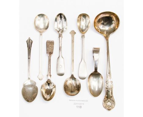 A white metal sauce ladle, together with a child's silver pusher spoon, and five various silver teaspoons
