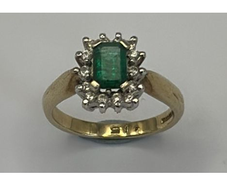 Emerald and diamond cluster ring in hallmarked 9ct gold. Emerald dimensions 6.1 x 4.1mm, estimated total diamond weight 0.15c