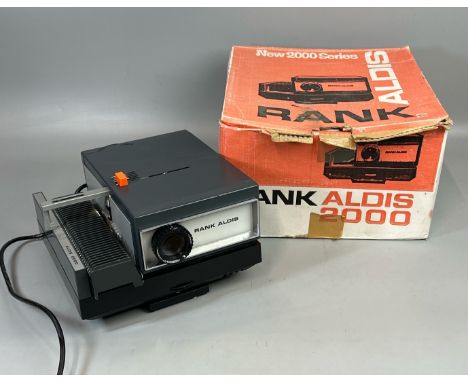 A Rank Aldis model 2000 slide projector with original box, powers up, not fully tested / T30