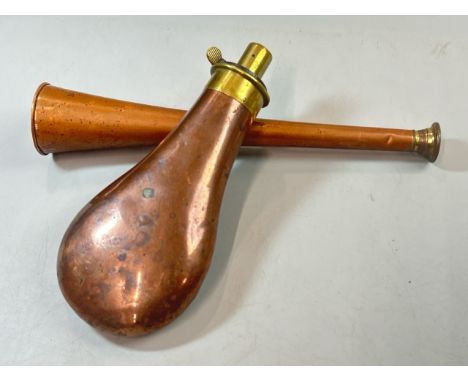 A copper and brass powder flask stamped "Nimrod" and "Bartram &amp; Co", 18.5cm high with a copper hunting horn 24.5cm long /