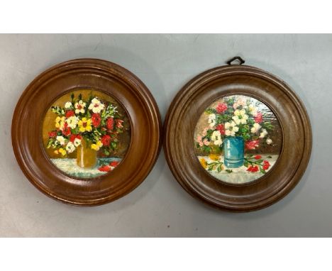 Two circular floral still life paintings, oil on wood, 10cm diameter / AN57