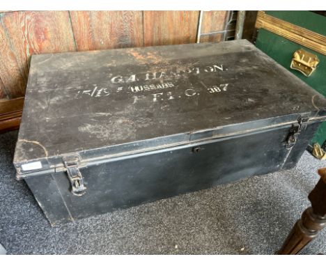 A large metal military trunk, name reads " G.A. Hampton", 31 x 91 x 54cm