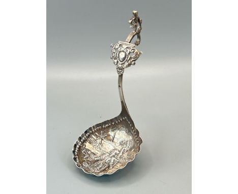 Dutch silver ladle, repousse decoration with import marks, c19th Century, weight, 29g / T39
