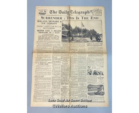 An original 'The Daily Telegraph' newspaper from May 5, 1945, three days prior to Victory in Europe (VE Day), titled "Surrend