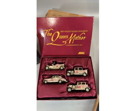 Two Lledo commemorative sets including The Dambusters 50th anniversary and The Queen Mother vehicle set with a 1977 book of f