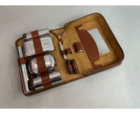 A vintage gents grooming set stamped "Chromium plated" with Gillette razor, set incomplete / T17
