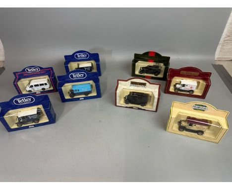 Eight Lledo promotional vehicles including Tetley Tea / T7 
