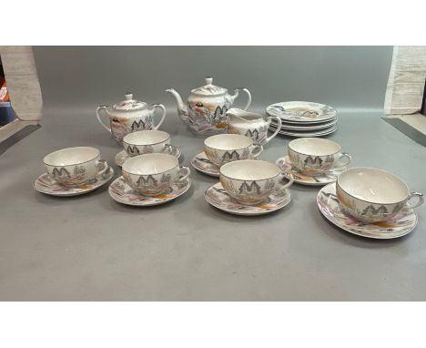 A 23 piece Japanese "Geisha" Lithophane part tea service / T18