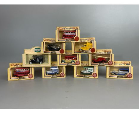 Ten boxed Lledo promotional model vehicles including Ford, Bassett's and Cinzano / T7