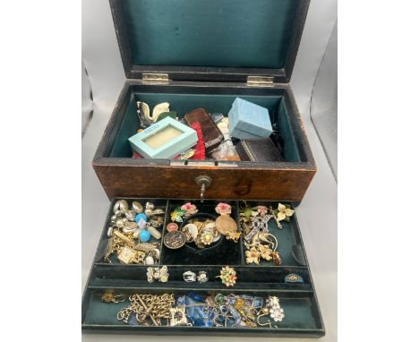 A jewellery case containing costume jewellery including a gold plated Accurist wristwatch and an opal doublet pendant and cha