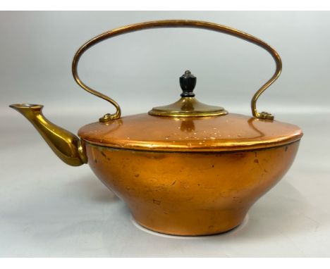 A copper and brass kettle of squat form, 18cm high (incl. handle), 21cm diameter / T34