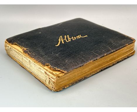 A small album partially filled with original sketches, paintings, poems and messages by various artists, contributors names i