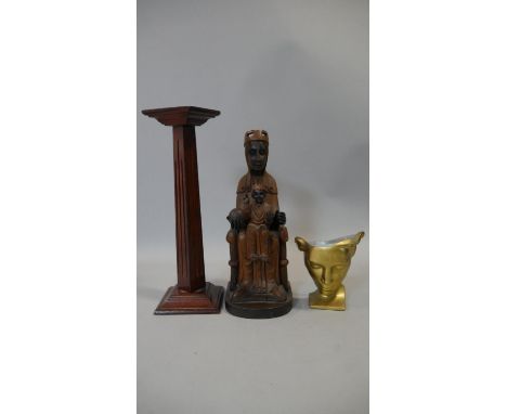 A gilt metal mask on stand with impressed marks to the back, a medieval style carving and a vintage oak candle stand.
H.46cm.