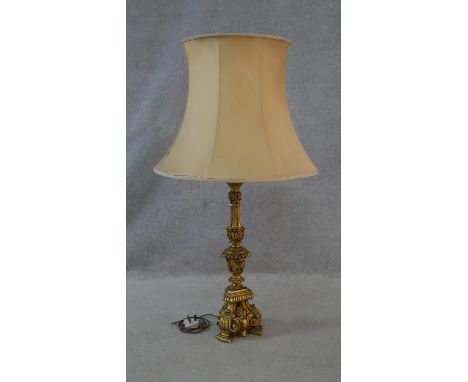 A vintage carved giltwood ecclesiastic style table lamp. H.94cm 