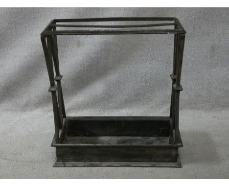 A vintage cast iron stick and umbrella stand with two long sections and lattice design ends. H.62 L.58 W.26cm 