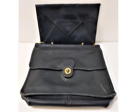 VINTAGE COACH WILLIS HANDBAGin black leather and numbered H6U-9927, together with a La Bagagerie blue leather envelope clutch