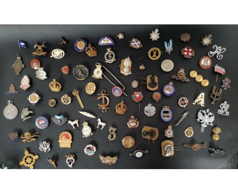 SELECTION OF MILITARY BADGES including the Auxiliary Territorial Service, Royal Artillery, Queens Royal Lancers, Royal Canadi
