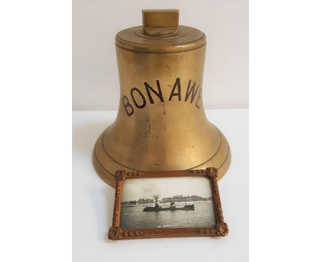 VINTAGE BRASS SHIPS BELLnamed to the 'Bonawe', 22cm high, lacking the clapper, together with a black and white picture of SS 