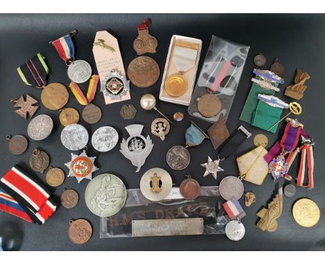 SELECTION OF MILITARY MEDALS AND BADGES including a Russian medal for military merit, German occupation of Czechoslovakia med