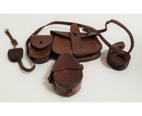 WWI AMMUNITION POUCHin brown leather with a belt loop, marked to the back Silverman & Co 1915 London, a brown leather compass