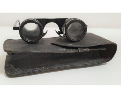 PAIR OF VINTAGE KERSHAW SPORTSMAN BINOCULAR GLASSESwith adjustable lenses, in a black leather case with a retailers label 'J.