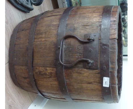 Coopered oak barrel with twin carrying handles and carved initials G R