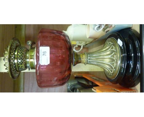 Victorian oil lamp with cranberry glass reservoir