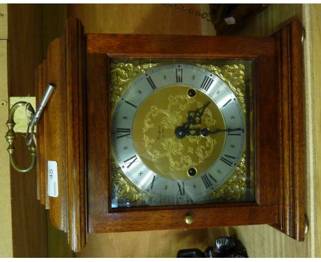 Modern Woodford chiming mantel clock with brass face