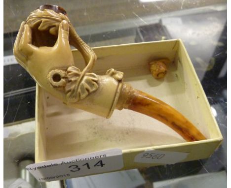 Meerschaum style pipe in the form of a hand
