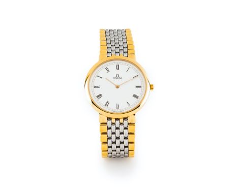 DeVille model. Quartz movement. Stainless steel and yellow gold case and wristband. In good condition.32mm