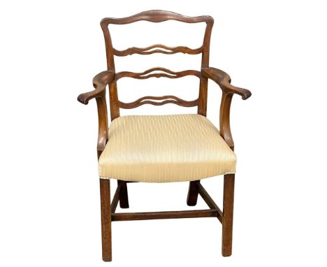 A George III mahogany Chippendale style armchair. Circa 1800. 