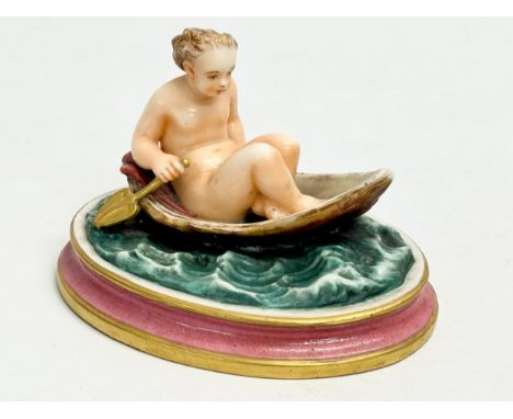 A rare 19th century Royal Worcester Nude Lady Rowing boat figurine. 12.5x10x8.5cm 